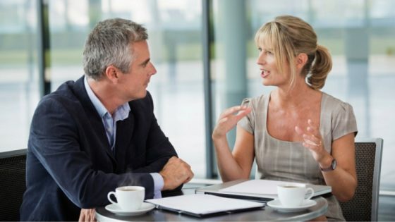 Nonprofit leader meeting with a prospective major donor to discuss philanthropic goals and build a trusted relationship.