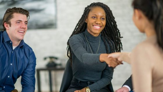 An image depicting a handshake or a group of people working together can symbolize the collaboration between donors and organizations to achieve common goals.